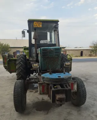 Жатка, установленная на трактор T40. Установлен двигатель MTZ. Работает исправно 1