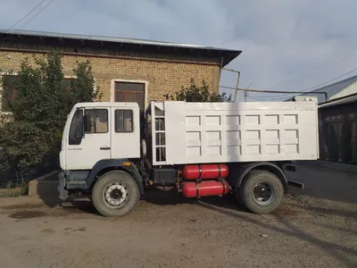 Самосвал MAN, 2013 года 1