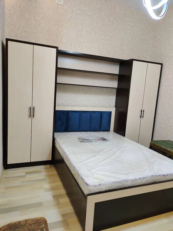 Двухспальняя кровать со шкафом