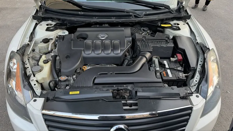 Nissan Altima rodnoy ideal — фото 7