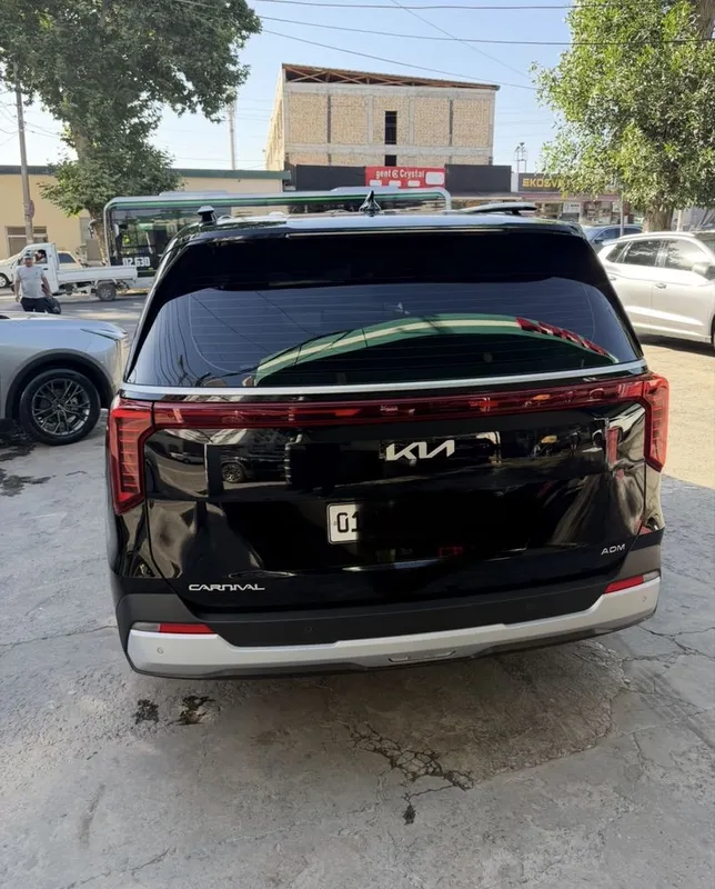 Своя KIA Carnival 2026 (рестайлинг, обновлённый) цвет чёрный. 3 Своя KIA Carnival 2026 (рестайлинг, обновлённый) цвет чёрный. 3