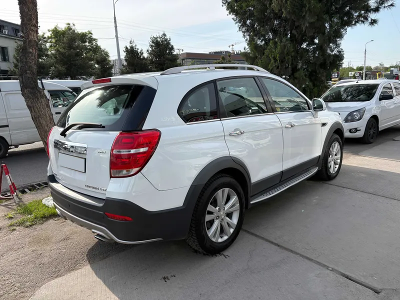 Oq Chevrolet Captiva yo‘ltanlamasi sotiladi 2 Oq Chevrolet Captiva yo‘ltanlamasi sotiladi 2