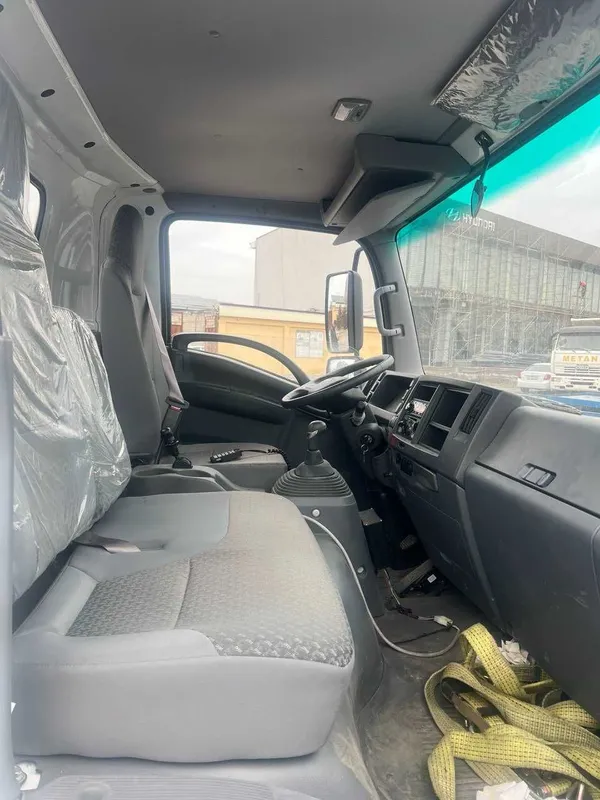 ISUZU ELF KV100 Эвакуатор — фото 5