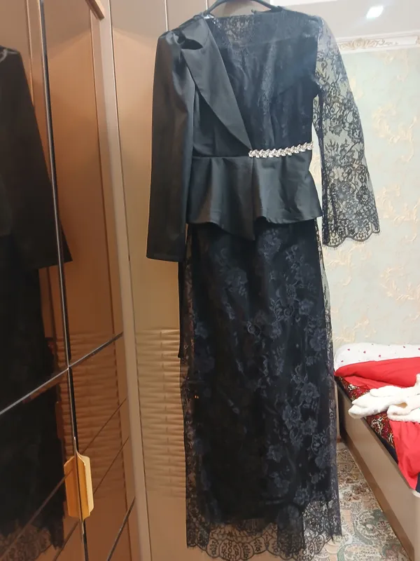 Koylak qora rangli razmeri S (48). 150.000 so'm