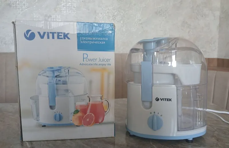 электрическая соковыжималка марки Vitek