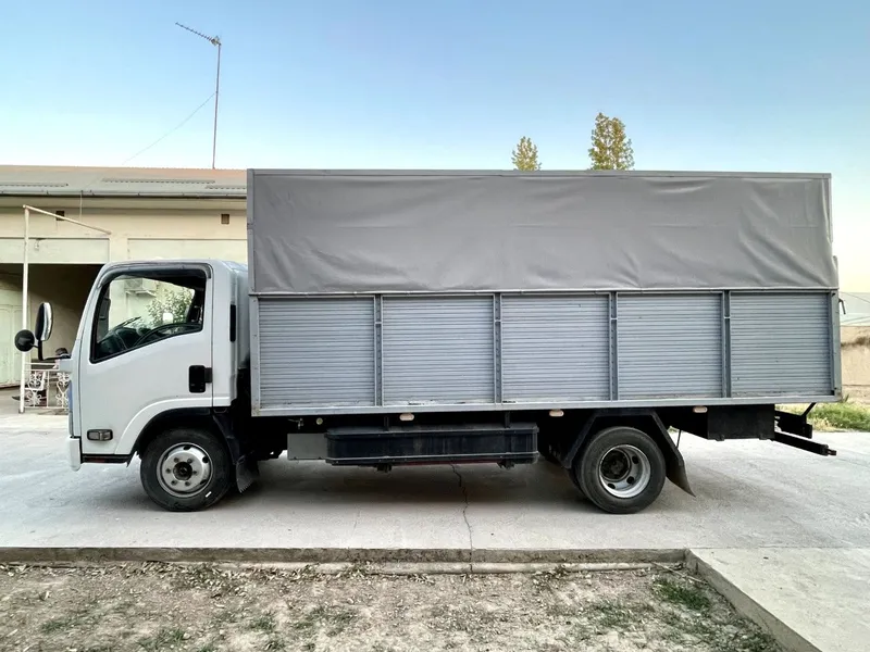 ISUZU Бортовой с тентом — фото 3