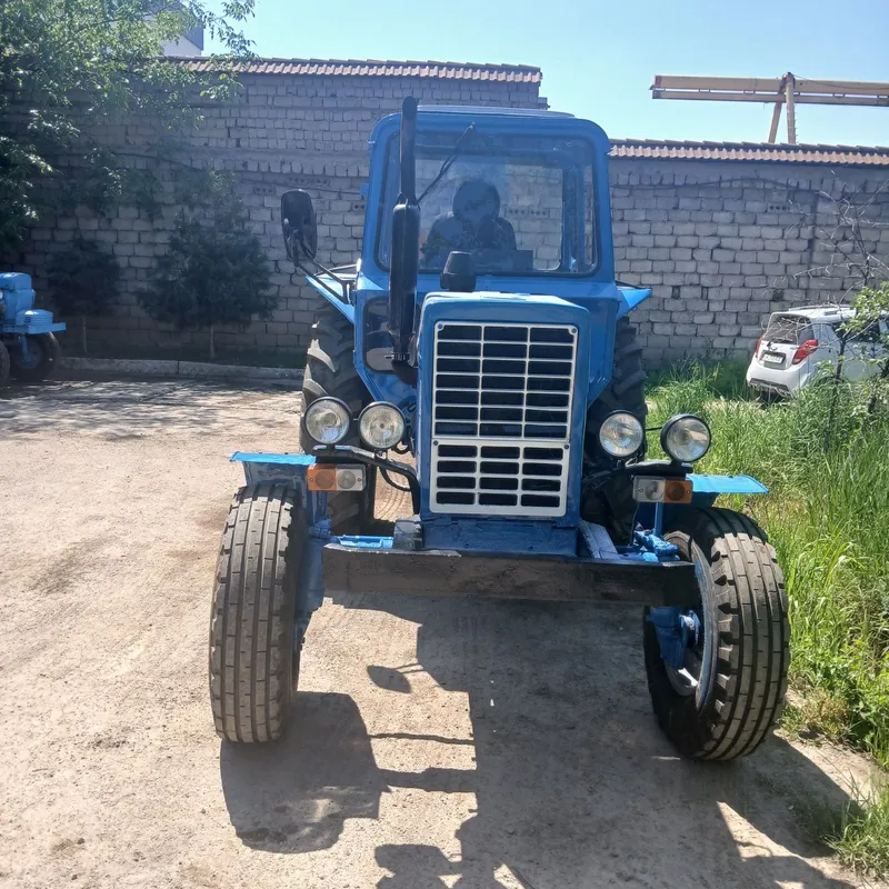 Услуги трактора Саг и откачка 1