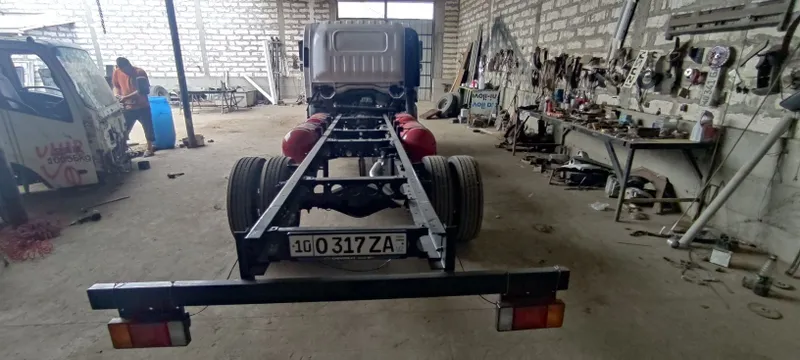 Isuzu avtobusdan yasalgan matori karobka zadni moʻs avtobus 3 Isuzu avtobusdan yasalgan matori karobka zadni moʻs avtobus 3