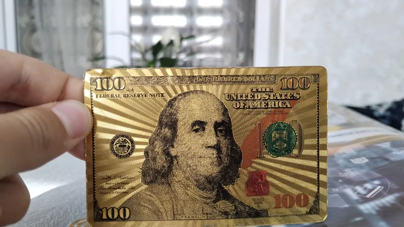 oltin dollar suvineri 3donasi