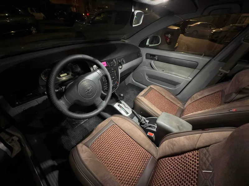 Lacetti 1.8 AT Ayol kishi haydagan ideal holatda toliq servis qilingan — фото 5
