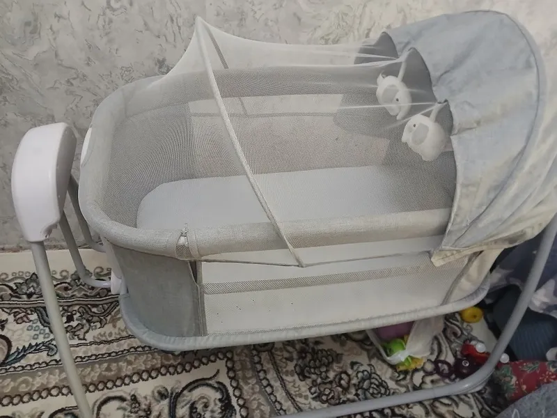 Muzikali tebranadigan bolalar belanchagi