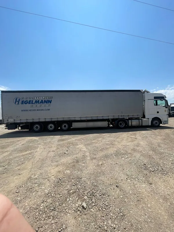 MAN TGX 18.500 EURO 6 + SCHMITZ Прицеп Сотилади 2