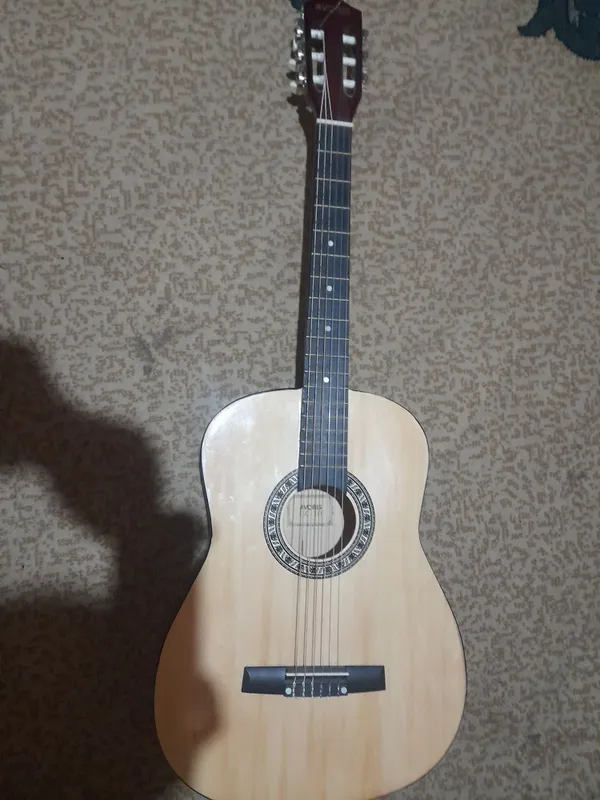 Gitara i bilan ifial xolatta