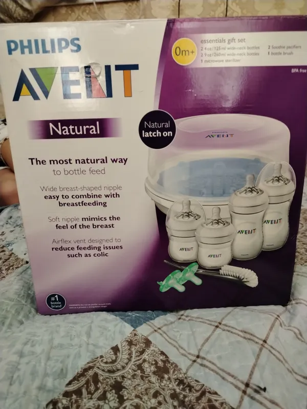 Стерилизатор Philips Avent для детских бутылочек.