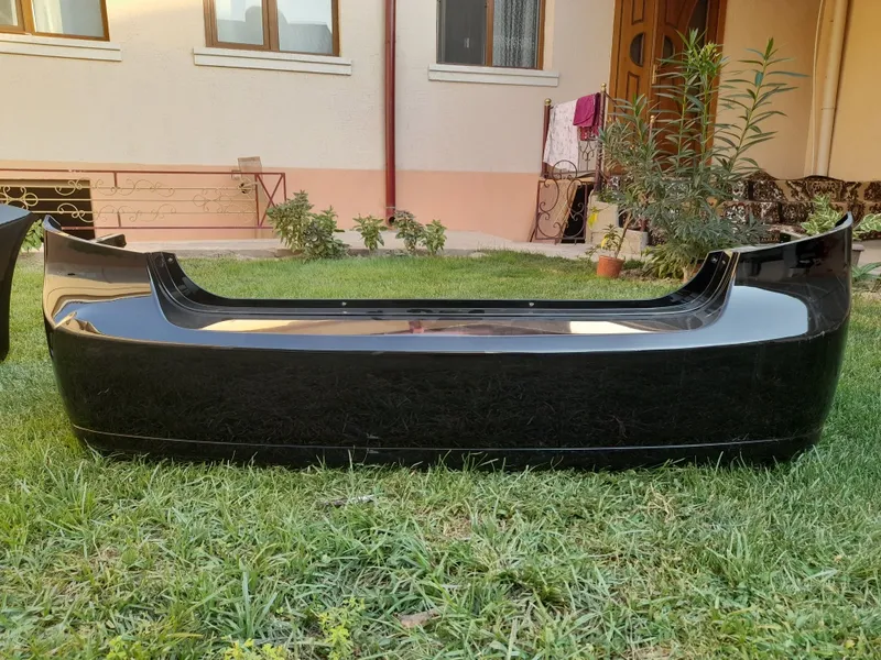 Бампер от жентры б/у есть царапины ушки целые не сломленый задный