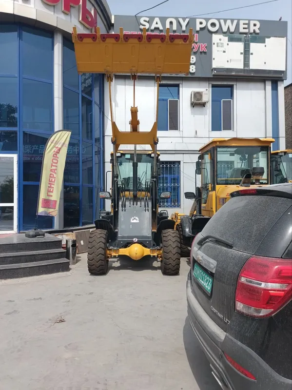 Kovish ustida sovatkasi bor pogruzchik — фото 3