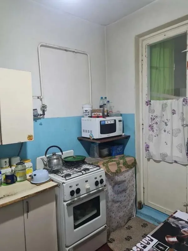 Zudlik bilan 2 xonali kvartira sotiladi, 7-mikrorayon, 5-qavat — фото 4