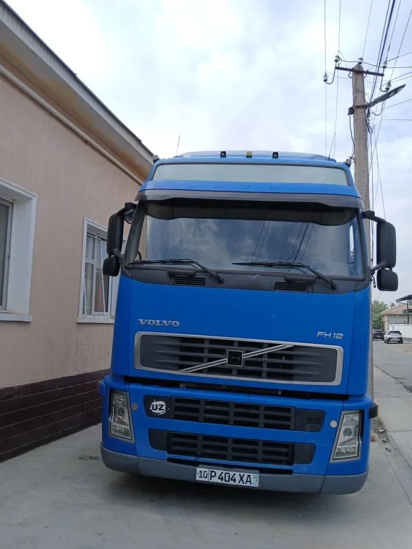 Volvo FH12 pirisepi bilan 1 Volvo FH12 pirisepi bilan 1