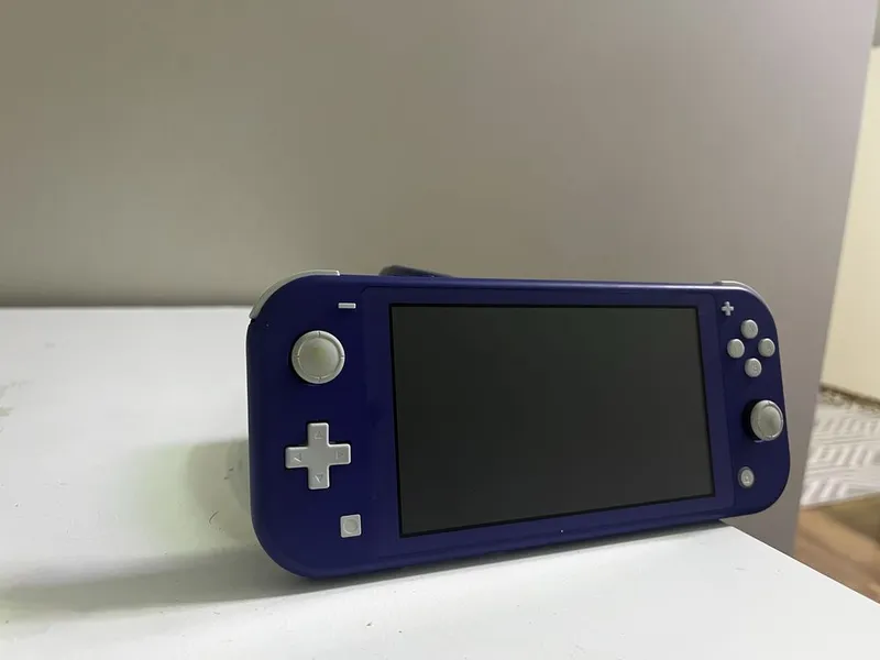 Nintendo Switch Lite состояние новое, без дефектов, торг уместен — фото 4