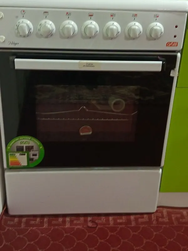 газ плита Artel