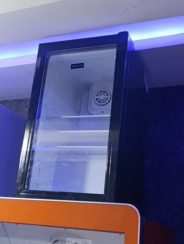 Черный красавец от AIWA: Компактный воздушный холодильник (65 л) 3
