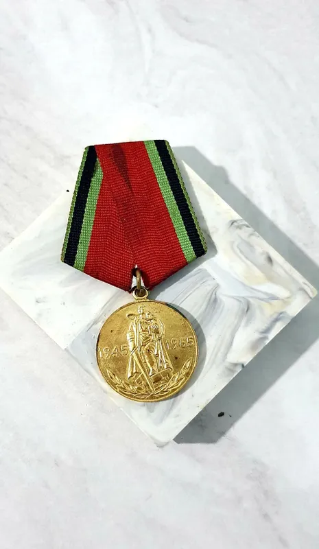 Tanga va medallar tuplami
