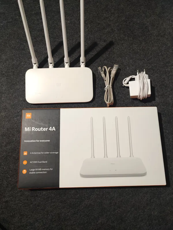 Xiaomi Mi Wi-Fi Router A4 (100 Мбит/с) — фото 1 Xiaomi Mi Wi-Fi Router A4 (100 Мбит/с) — фото 1