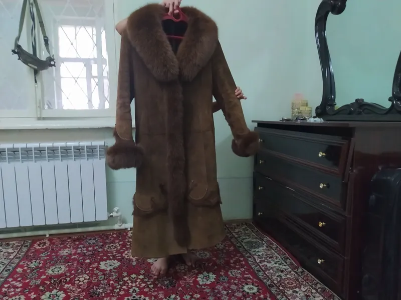 пальто очень красивое ни разу не ношенная