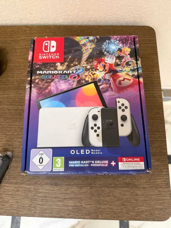 Продается Nintendo Switch OLED 64GB White.