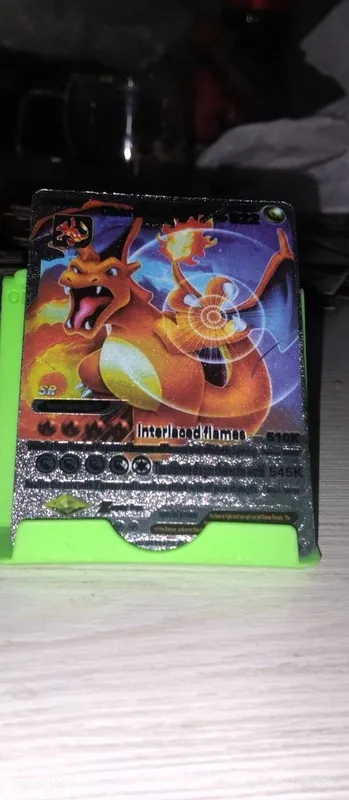 Charizard , holati yaxshi narxi 20 000 ming som
