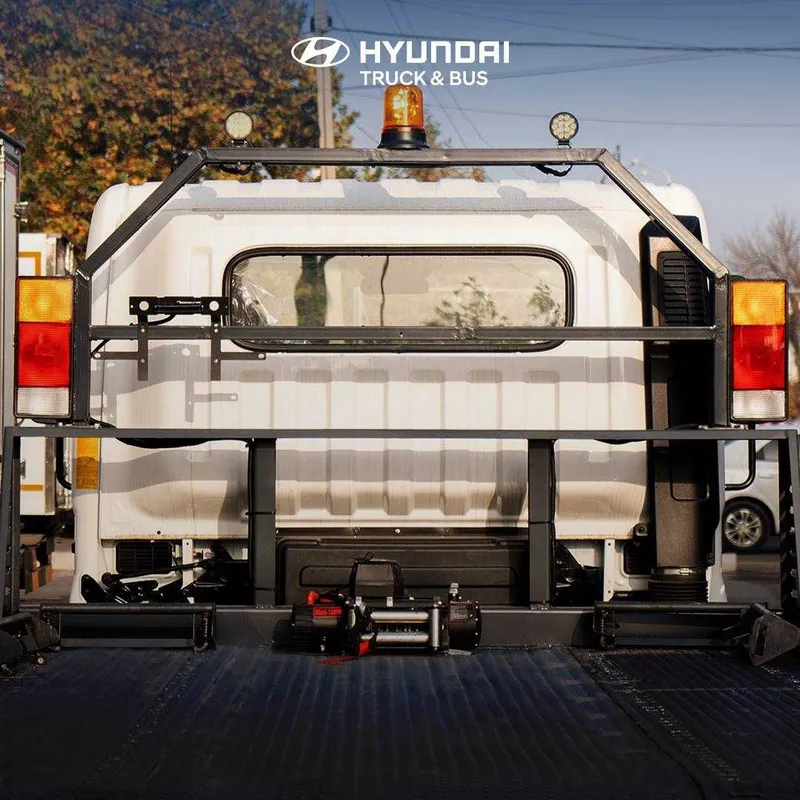 Эвакуатор с лебедкой и трапами платформой HYUNDAI EX8 — фото 1