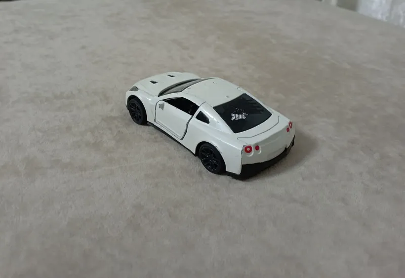 Железная машинка Nissan gtr am3 sport игрушка. — фото 1