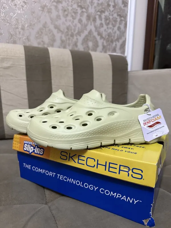 Оригинал кроксы и сланцы от бренда SKECHERS USA — фото 5