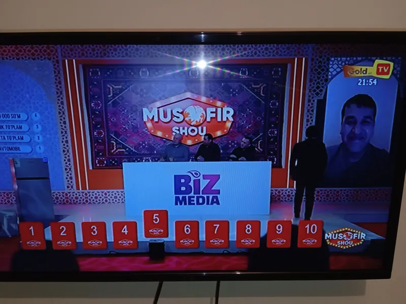 Televizor Smart Emas usta ko'rmagan ekrani tinniq — фото 2