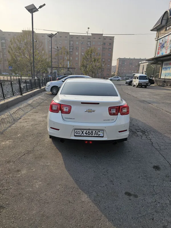 Chevrolet ,Malibu oq jemchug 3 Chevrolet ,Malibu oq jemchug 3