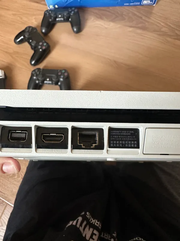 PlayStation 4 Slim/1 ТБ. Коробка, документы — полный комплект. Новая 5