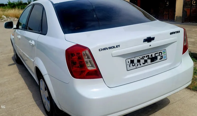 Chevrolet Lacetti Gentra — фото 1