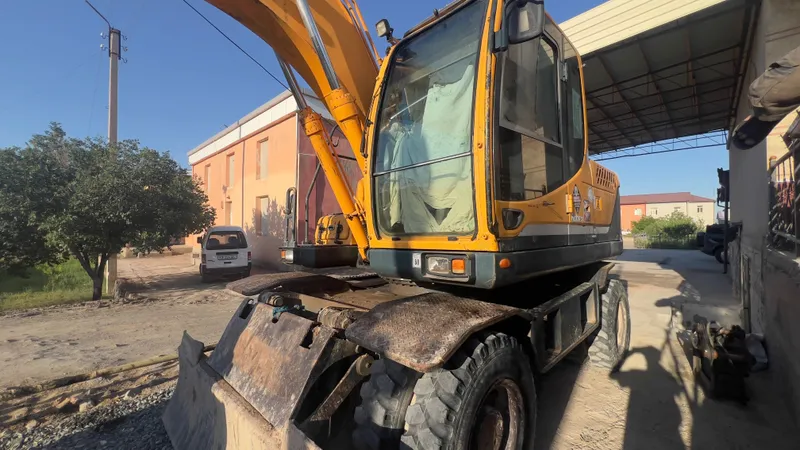 Ekskavator Hyundai 140 W. Экскаватор Хундай 140 2