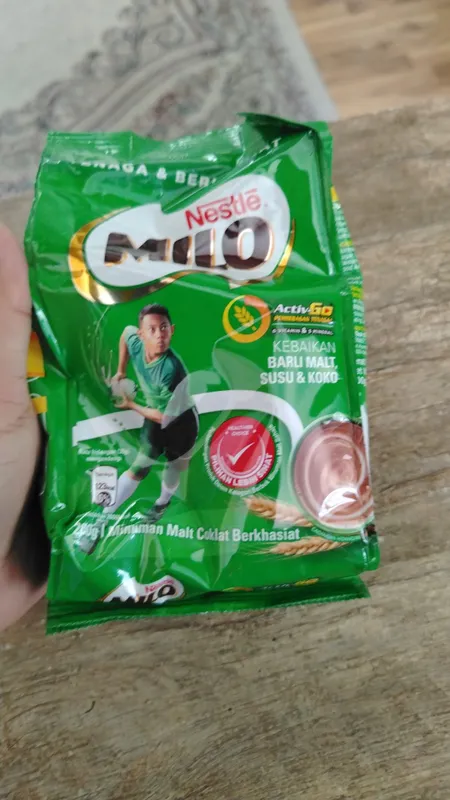 kakao bor bolalarga nestle kakao sutga qoshib i