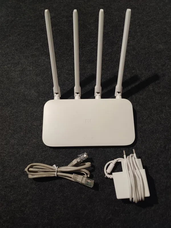 Xiaomi Mi Wi-Fi Router A4 (100 Мбит/с) Xiaomi Mi Wi-Fi Router A4 (100 Мбит/с)