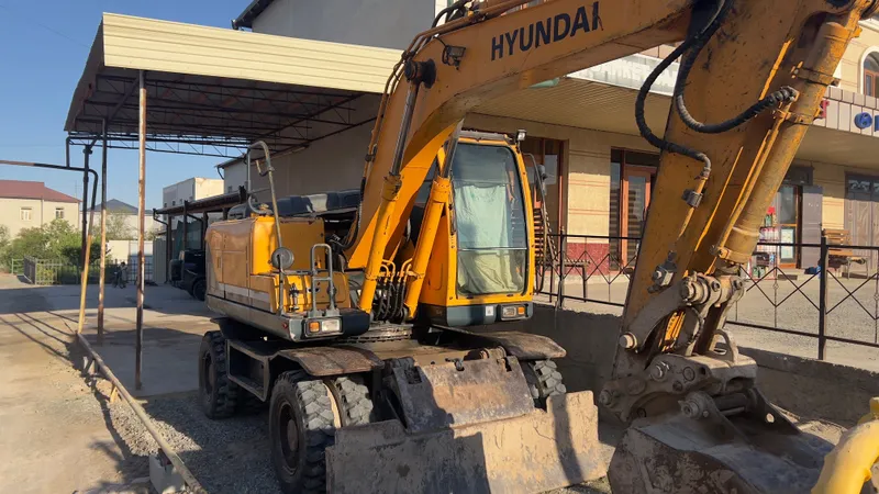 Ekskavator Hyundai 140 W. Экскаватор Хундай 140 1