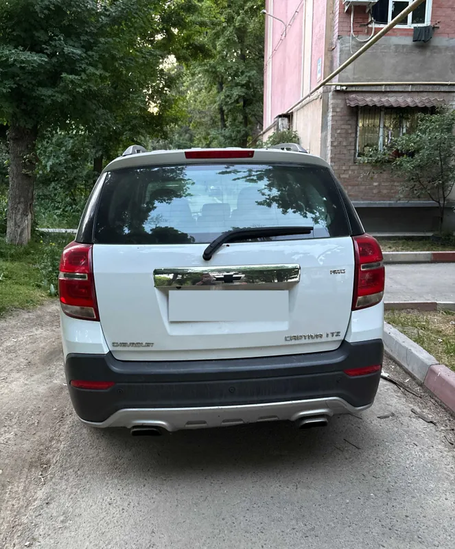 Oq Chevrolet Captiva yo‘ltanlamasi sotiladi 1 Oq Chevrolet Captiva yo‘ltanlamasi sotiladi 1