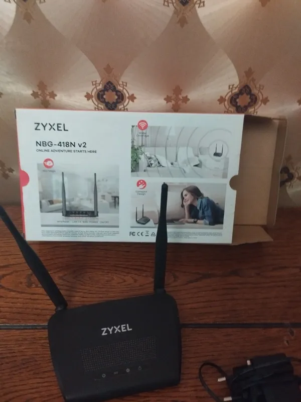 Беспроводной маршрутизатор Zyxel NBG-418N v2 2 Беспроводной маршрутизатор Zyxel NBG-418N v2 2