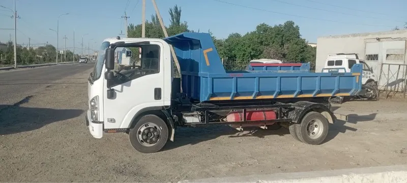 Isuzu avtobusdan taxlangan gruzavoy 2014 — фото 2