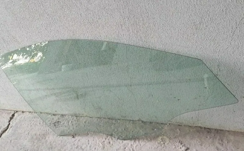 Nexia 2 shopir eshigini oynasi — фото 1