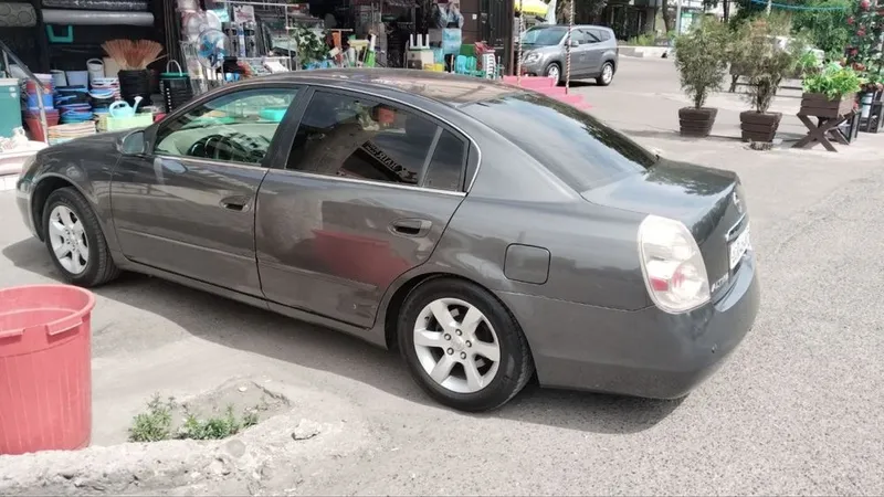Nissan Altima 2004 год 4