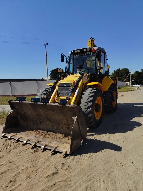 New Holland 115 Pagruzchik 3 New Holland 115 Pagruzchik 3