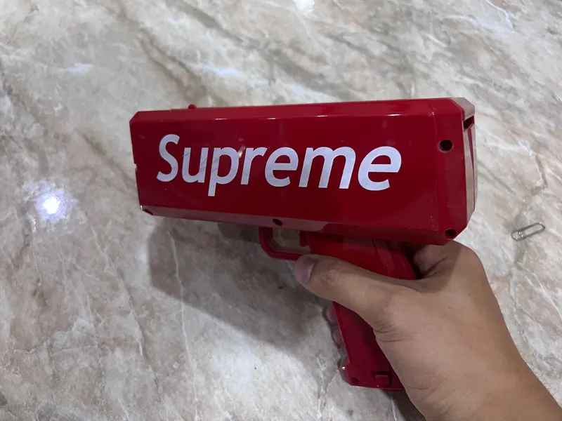 Пистолет Supreme для купюр