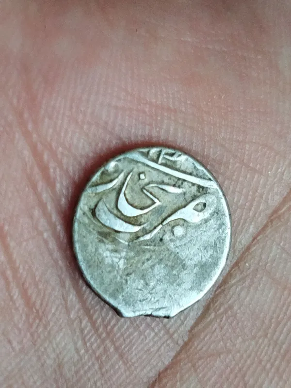 Qadimgi Buxoro amirligiga tegishli kumush tanga — фото 2
