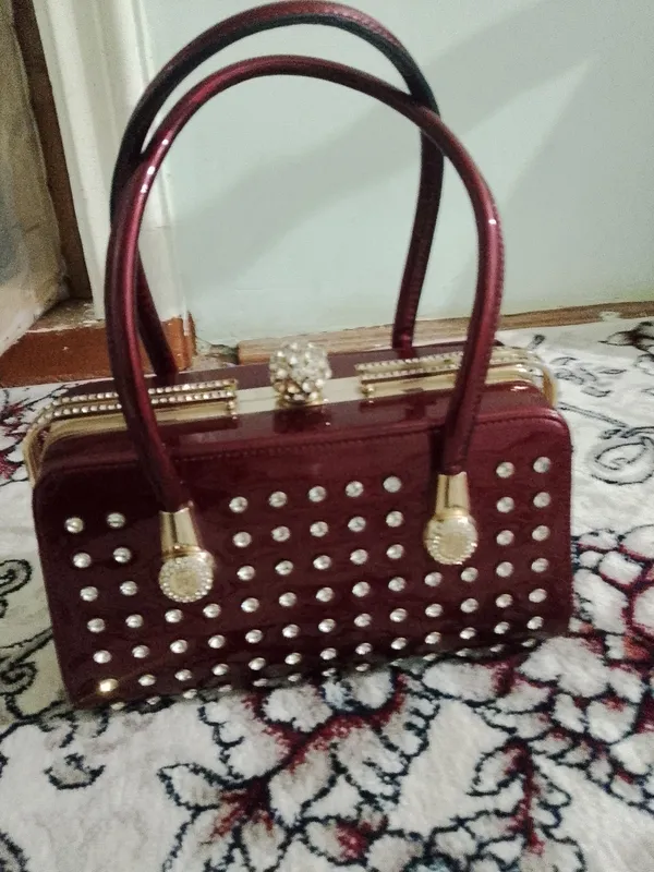 ayollar sumkasi
